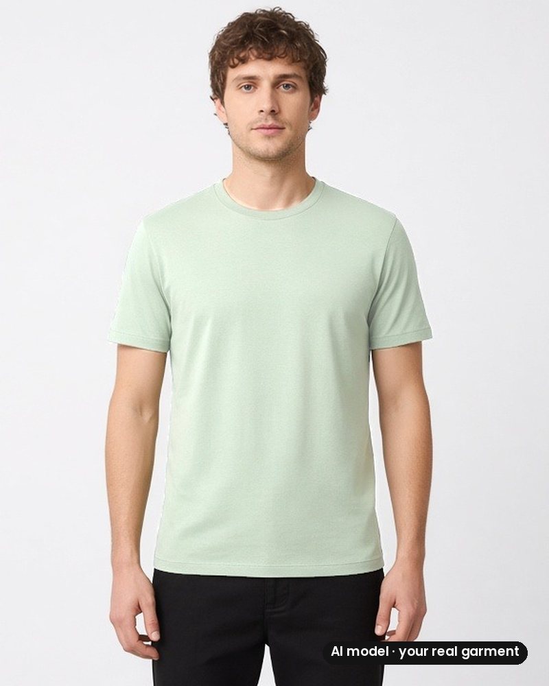 The same sage-green t-shirt worn by an AI-generated model